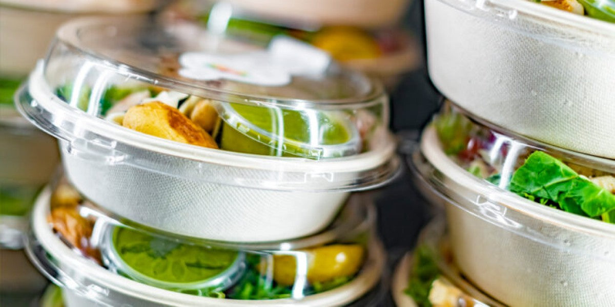 Grab-and-go refrigerated display stocked with packaged meals and drinks for restaurants