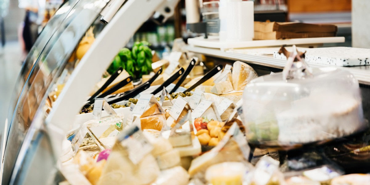 Deli case and bakery display case comparison for refrigerated food merchandising