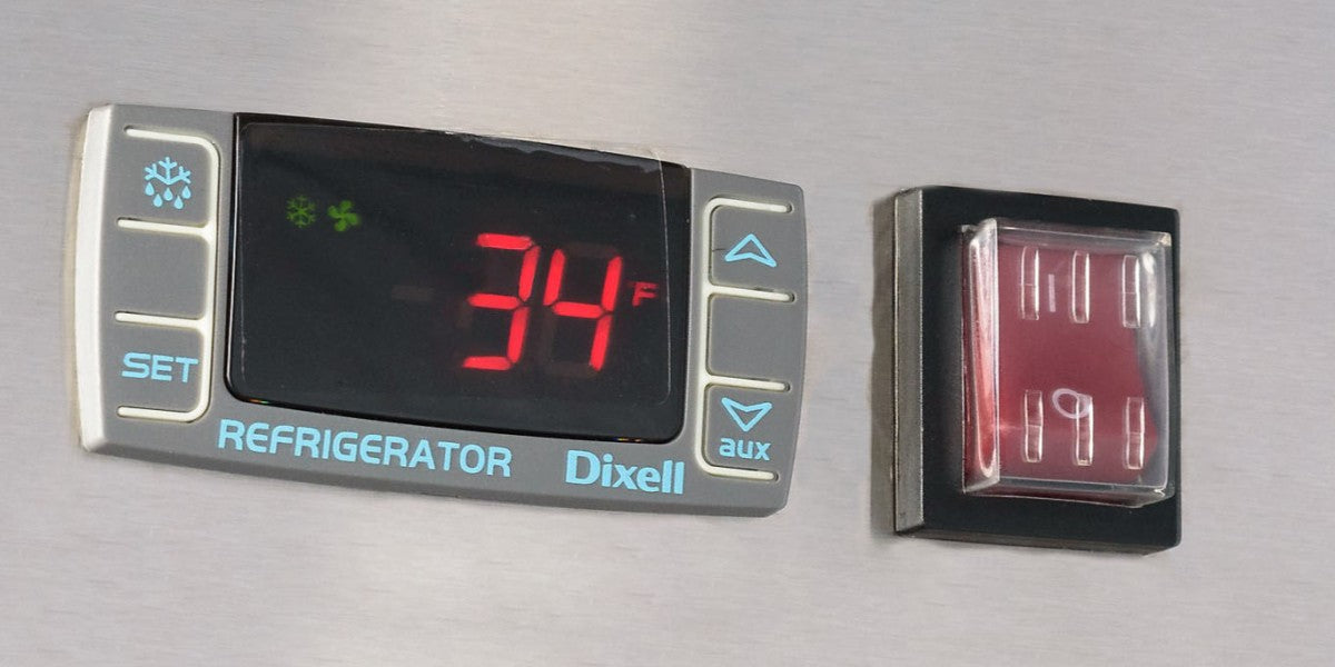 New commercial refrigerator plugged in and cooling down after installation