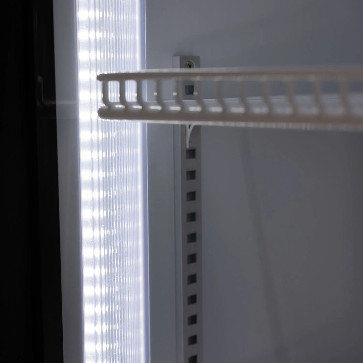 Procool High Efficiency Triple Sliding Door White Display Cooler - 53 cu. ft.