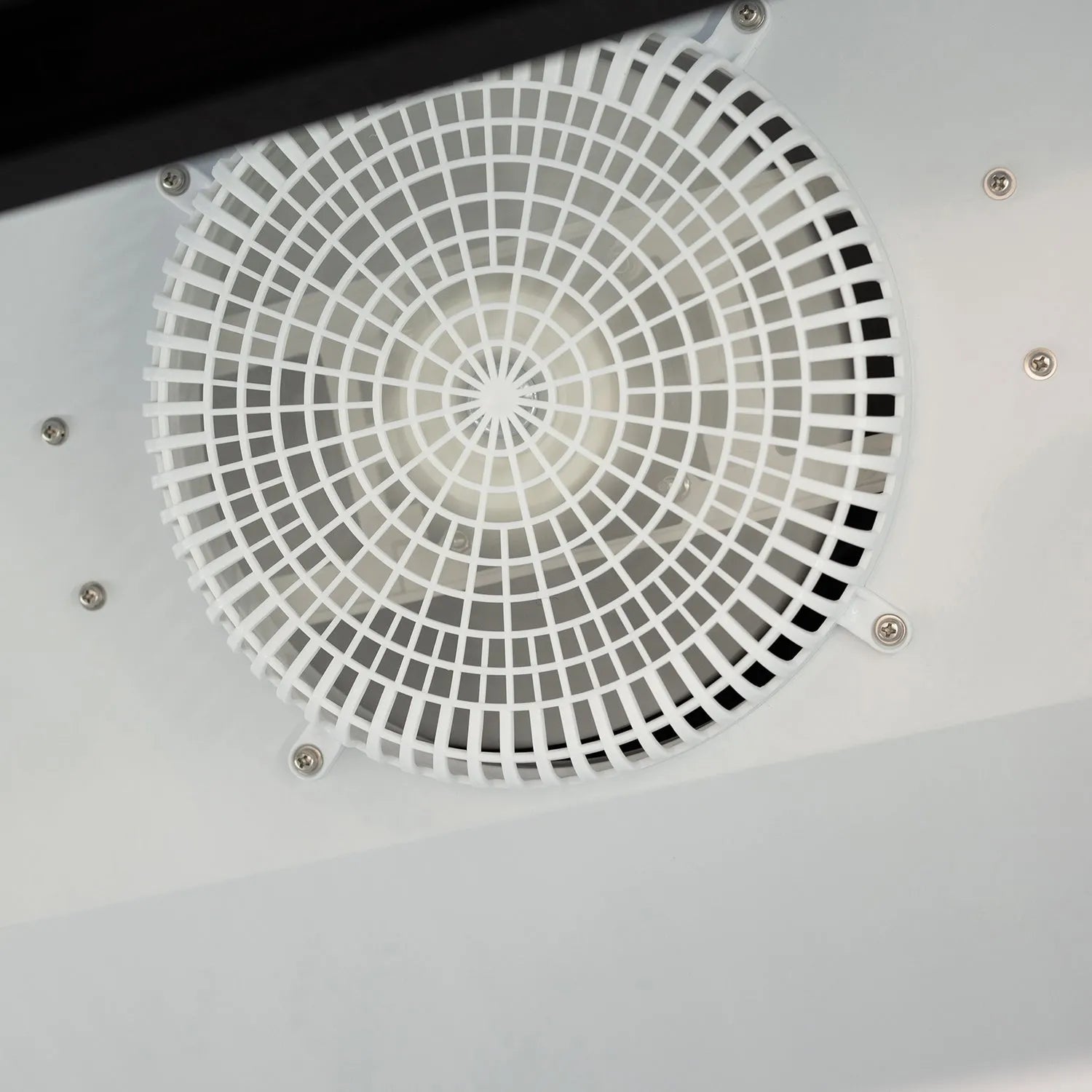 Close-up of a circular grid on a white background