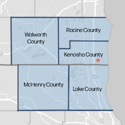 A map graphic highlighting four counties in Iowa: Walworth County, Racine County, Kenosha County, and McHenry County, with Lake County also visible. A small red star marks a location within Kenosha County.