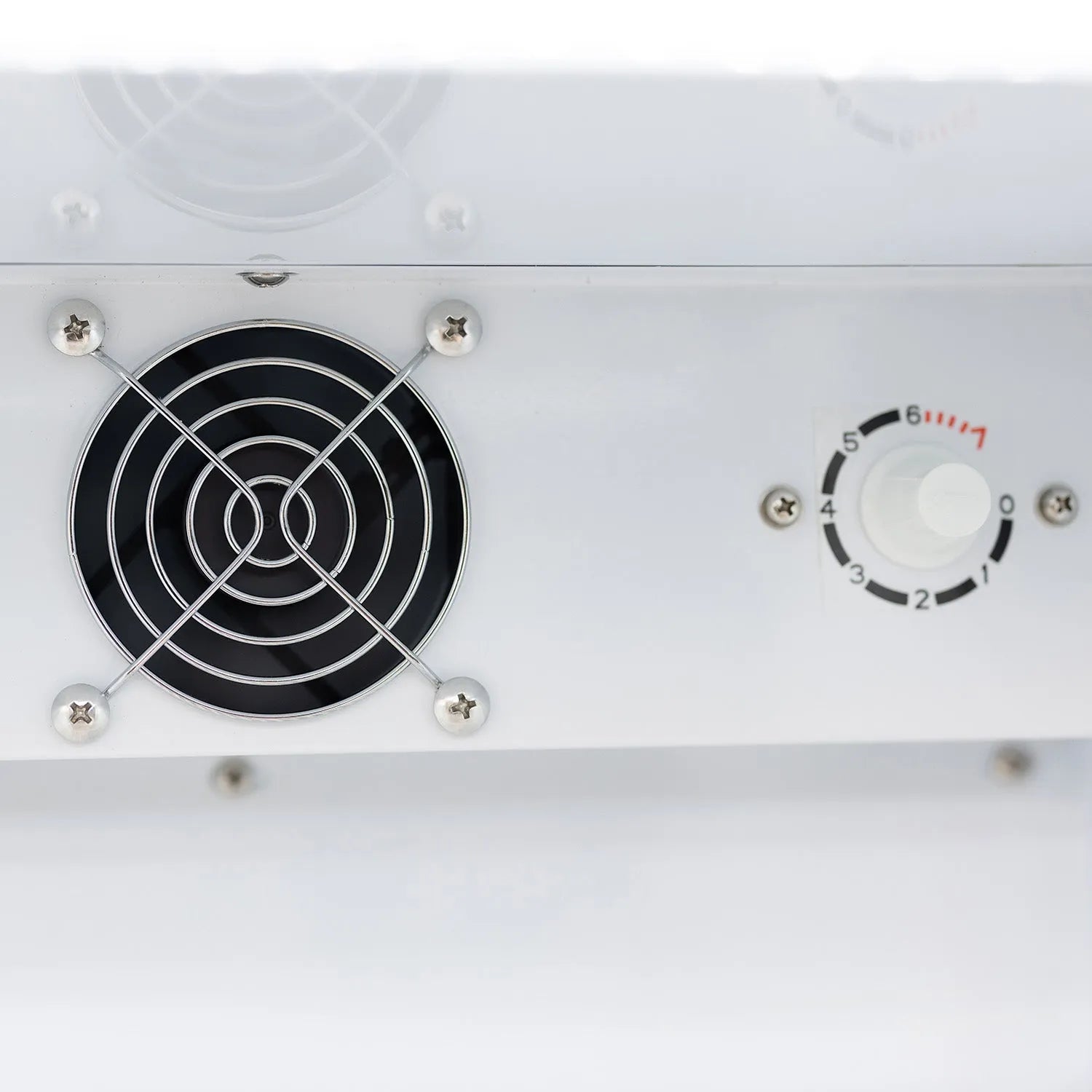 Control panel with a cooling fan and temperature dial on a white background