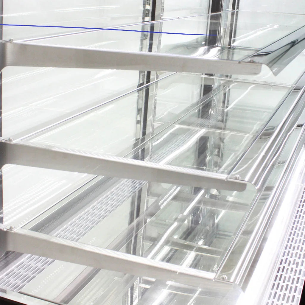 Metal shelving unit with glass panels in a warehouse setting