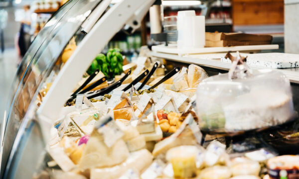 Deli case filled with food.