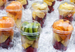 commercial ice maker for grocery stores, fruit cups in a cooler with ice